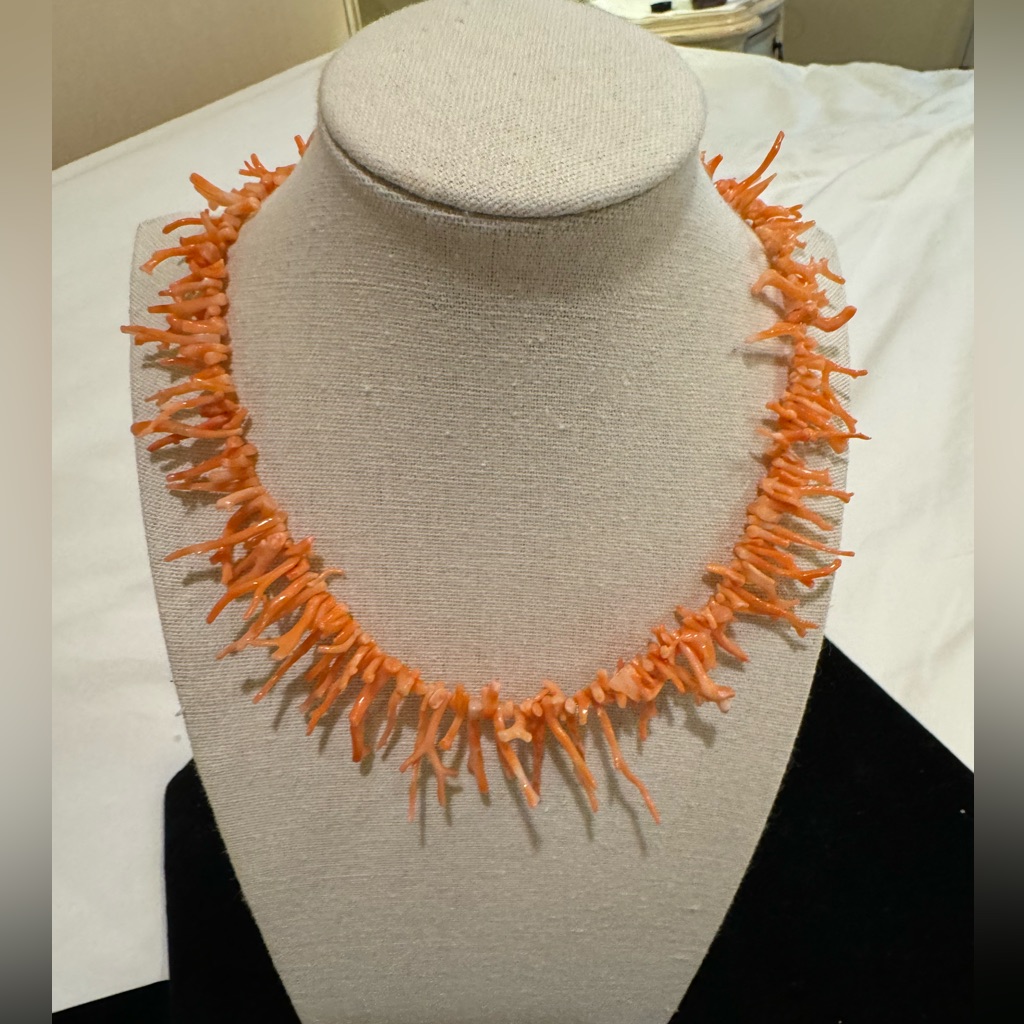 This A Vintage Long Angle Hair Coral Necklace.